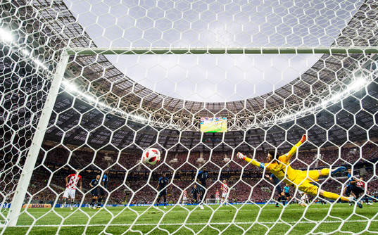 Ivan Perisic of Croatia scores the 1-1 goal behind