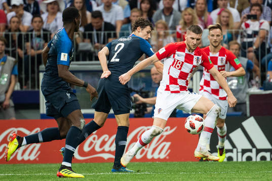 Benjamin Pavard of France and Ante Rebic of Croatia