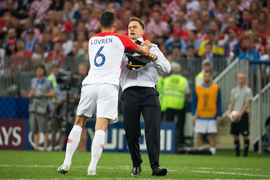 Dejan Lovren of Croatia in a situation with a man who has