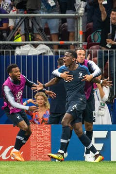Paul Pogba of France celebrates with team mates