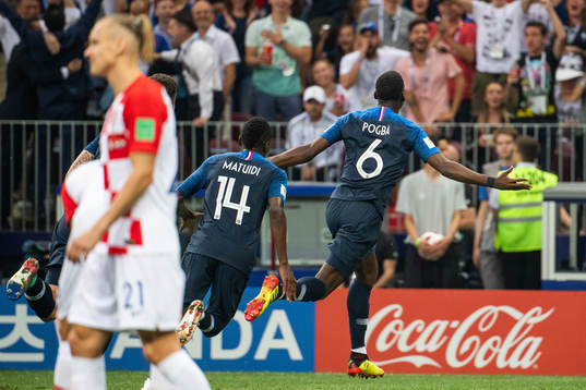 Paul Pogba of France celebrates scoring 3-1
