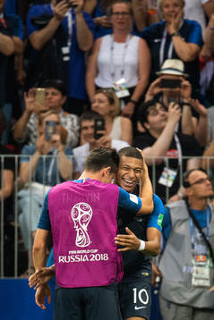 Kylian Mbappe of France celebrates with team mates