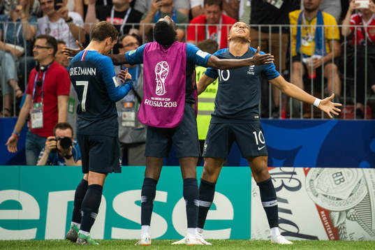 Kylian Mbappe of France celebrates with team mates
