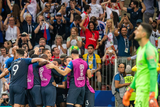 Kylian Mbappe of France celebrates with team mates