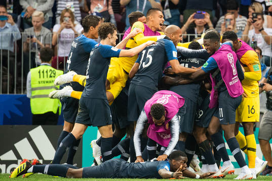 Kylian Mbappe of France celebrates with team mates
