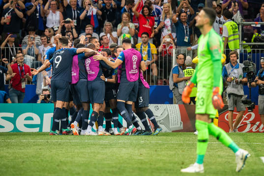 Kylian Mbappe of France celebrates with team mates