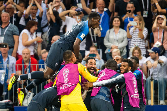 Kylian Mbappe of France celebrates with team mates