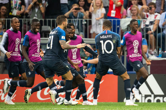 Kylian Mbappe of France celebrates with team mates