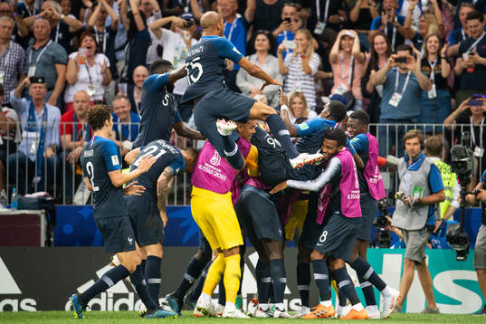 Kylian Mbappe of France celebrates with team mates