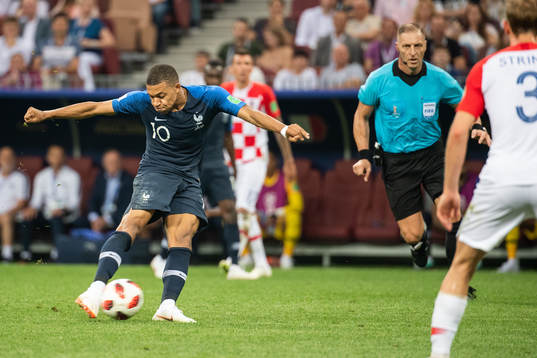 Kylian Mbappe of France scores 4-1