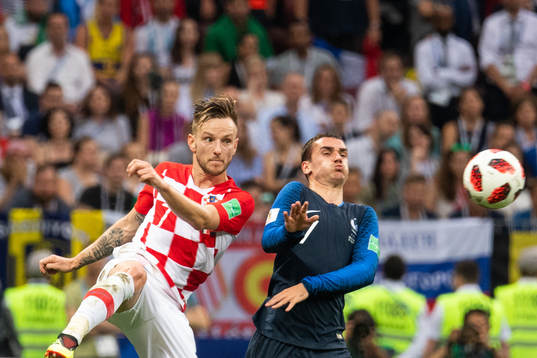 Ivan Rakitic of Croatia and Antoine Griezmann of France