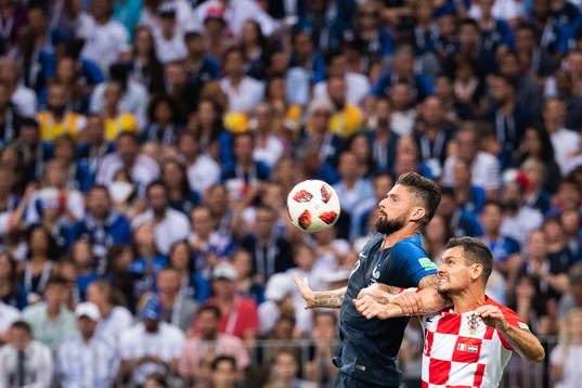 Olivier Giroud of France and Dejan Lovren of Croatia