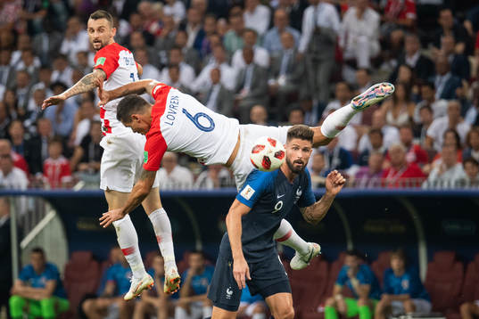 Dejan Lovren of Croatia falls in a duel with Olivier Giroud