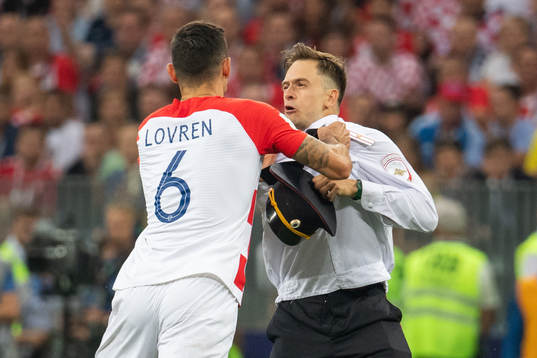 Dejan Lovren of Croatia in a situation with a man who has