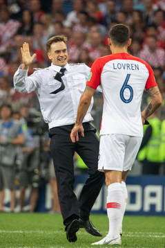 Dejan Lovren of Croatia in a situation with a man who has