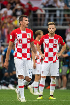 Mario Mandzukic and Ivan Rakitic of Croatia looks dejected