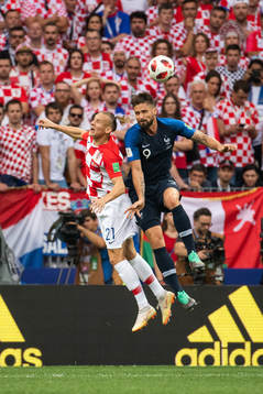 Dejan Lovren of Croatia and Olivier Giroud of France