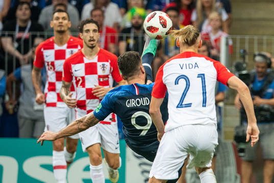 Olivier Giroud of France with a bicycleta