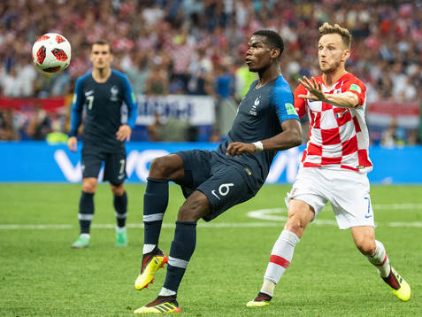 Paul Pogba of France and Ivan Rakitic of Croatia