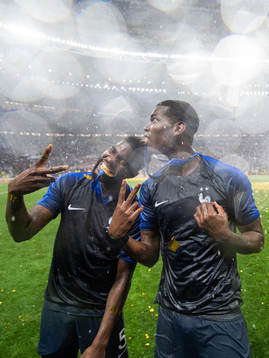 Samuel Umtiti and Paul Pogba of France celebrate
