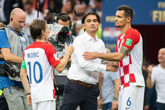 Luka Modric, head coach Zlatko Dalic and Dejan Lovren of