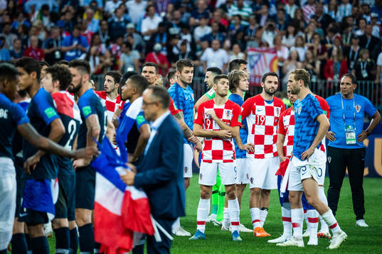 Andrej Kramaric and Milan Badelj of Croatia looks dejected