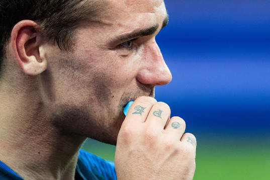 Antoine Griezmann of France in tears as he celebrate