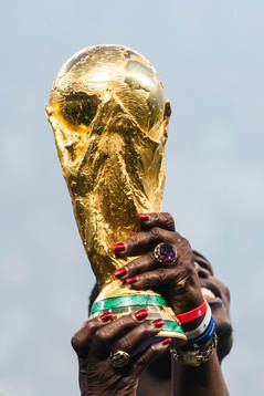 The trophy while France celebrates