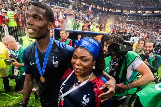 Paul Pogba of France and his mother celebrate
