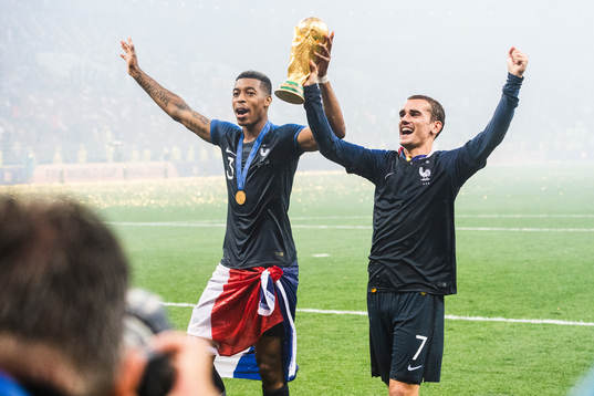 Presnel Kimpembe and Antoine Griezmann of France celebrate