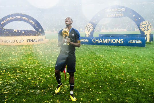Paul Pogba of France celebrates with the trophy