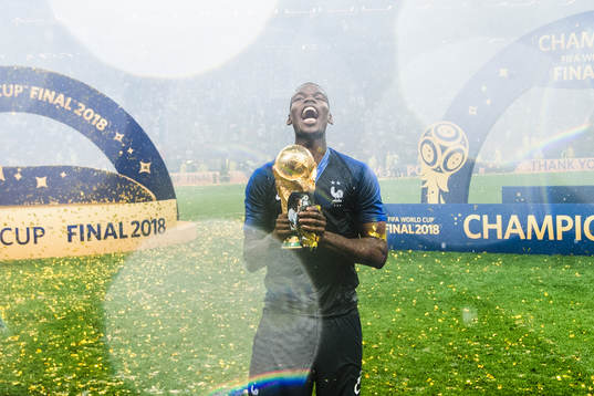 Paul Pogba of France celebrate with the trophy