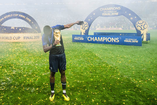 Paul Pogba of France celebrates with the trophy