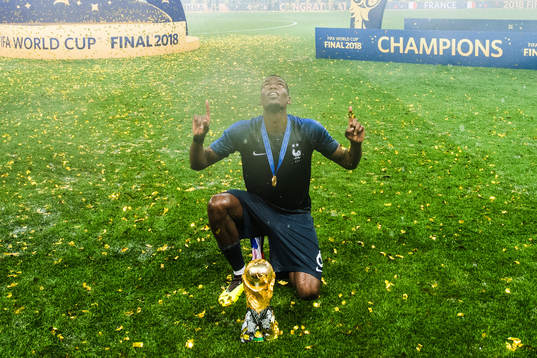 Paul Pogba of France celebrates with the trophy