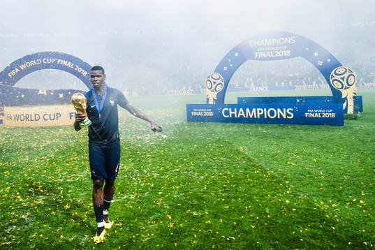 Paul Pogba of France celebrates with the trophy