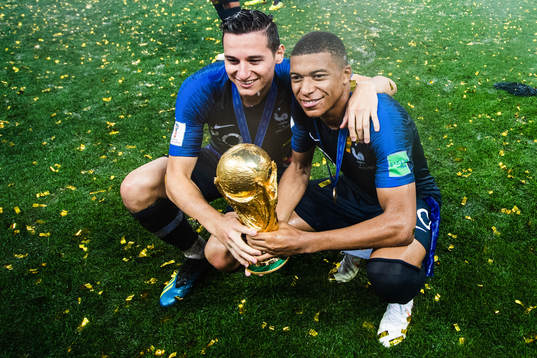 Florian Thauvin and Kylian Mbappe of France celebrates with