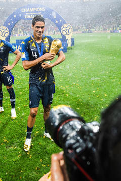 Raphael Varane of France celebrates with the trophy