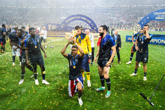 Presnel Kimpembe of France celebrates with the trophy