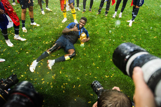 Samuel Umtiti of France celebrates with the trophy