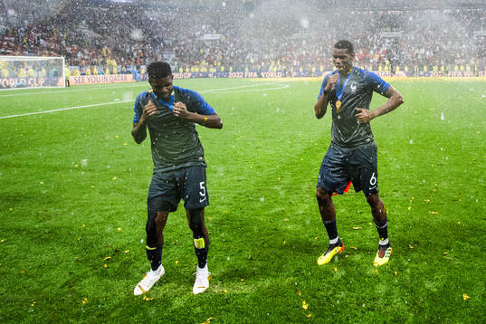 Samuel Umtiti and Paul Pogba of France celebrate