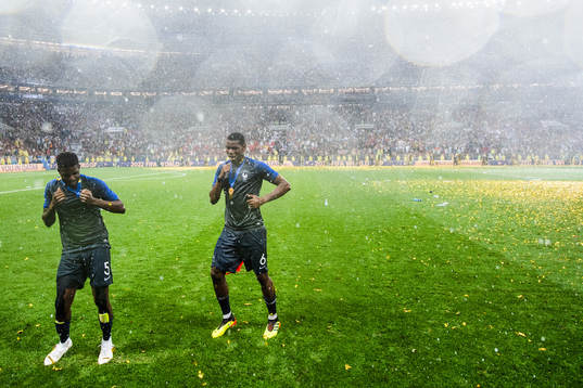 Samuel Umtiti and Paul Pogba of France celebrate