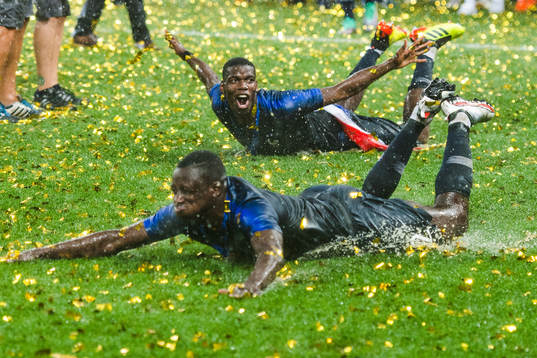 Paul Pogba of France slides