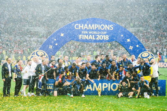 Players of France celebrate with the trophy