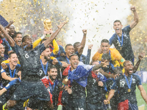 Players of France celebrate with the trophy