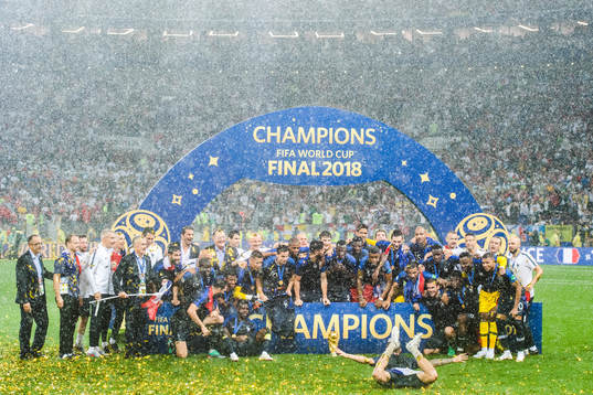 Players of France celebrate with the trophy