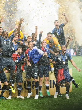 Players of France celebrate with the trophy