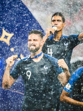 Olivier Giroud and Raphael Varane of France celebrates with