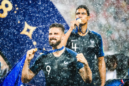 Olivier Giroud and Raphael Varane of France celebrates with