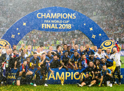 Players of France celebrate with the trophy