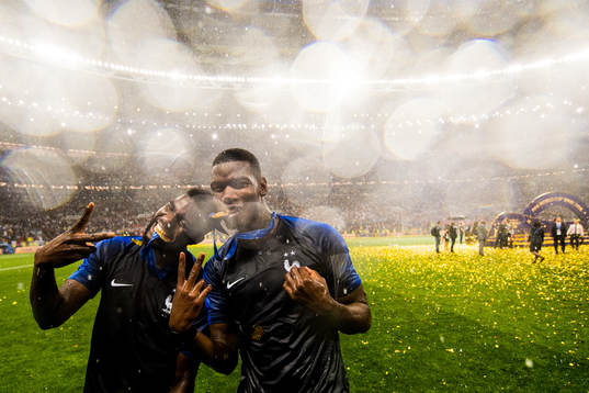 Samuel Umtiti and Paul Pogba of France celebrate